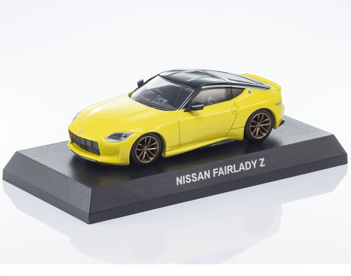 Nissan Fairlady Z Yellow - Kyosho Mini Car & Book - Scala 1/64