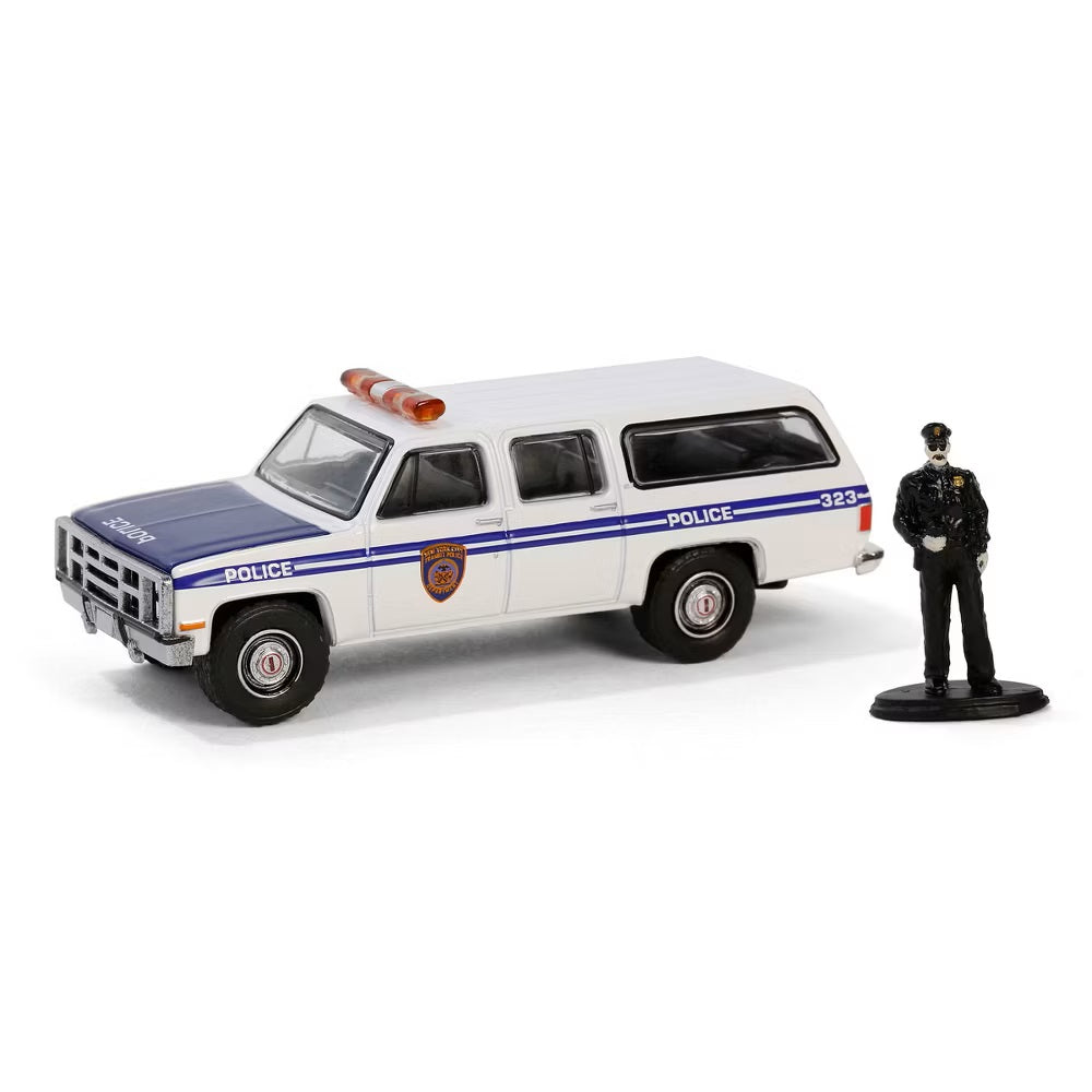 1985 GMC Suburban 2500 NYC Transit Police with Police Officer Figure - Series Hobby Shop - Greenlight - Scala 1/64