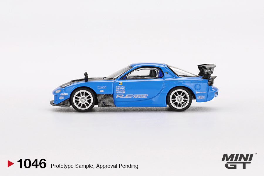 Mini GT - Mazda RX-7 RE-Amemiya 20B NA 3ROTOR-7 “Ama-san Go” 2024 - Scala 1/64 MGT01046-BL Blister Packaging