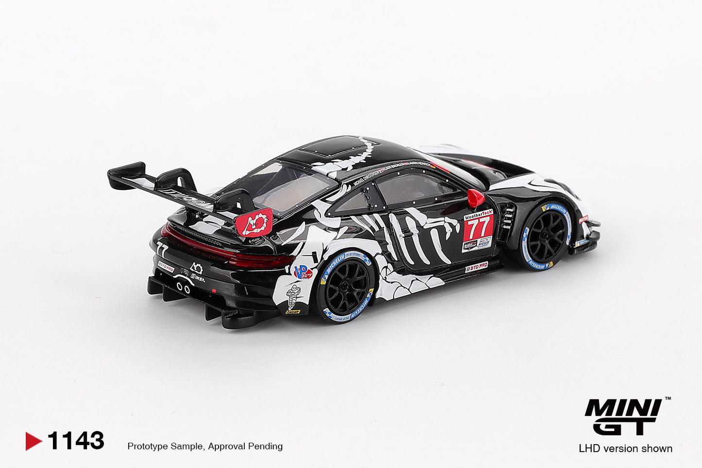 "Skeleton Rexy" Porsche 911 GT3 R #77 AO Racing 2025 IMSA  Petit Le Mans - Mini GT - Scala 1-64 MGT01143-L