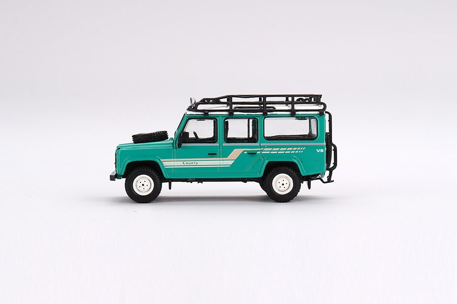 Land Rover Defender 110 1985 County Station Wagon Trident Verde LDH - Mini GT - Escala 1/64