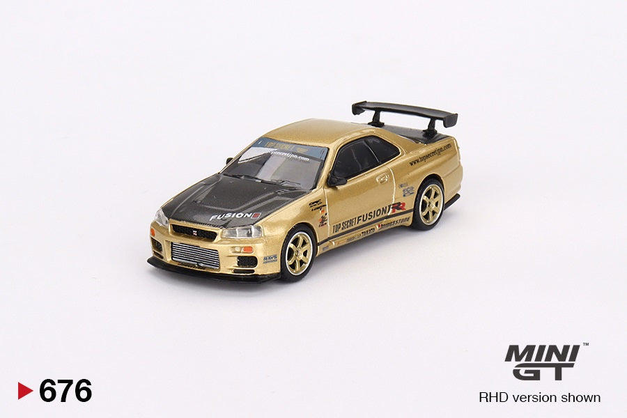 Nissan Skyline GT-R R34 Top Secret Top Secret Gold Borgeseidea.com foto 2