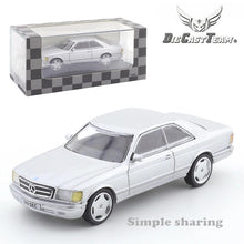 Laden Sie das Bild in den Galerie-Viewer, Mercedes - Benz 500 SEC Silver - DCT Die Cast Team - Scala 1/64
