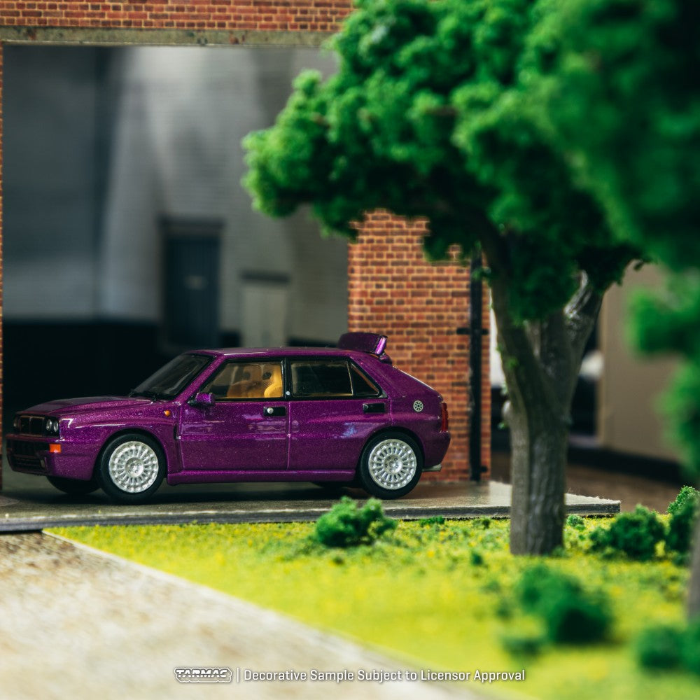Lancia Delta HF Integrale Viola - Tarmac Works - Scala 1/64 T64R-TL049-VI