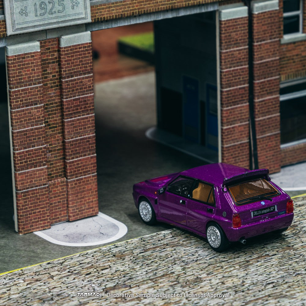 Lancia Delta HF Integrale Viola - Tarmac Works - Scala 1/64 T64R-TL049-VI